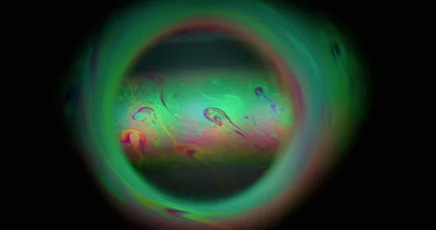 Spectrum blur soap planet eclipse sphere ink glow Stock Footage 313346087