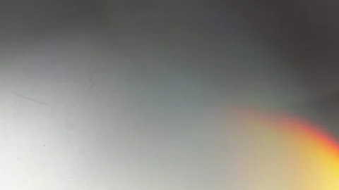 Spectrum light leaks on gray bokeh circles abstract loop Stock Footage 336716273