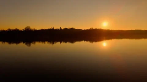 Specular sunset on the lake Video stock 261683038