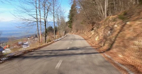 Sped up dashcam POV point of view driving on road in Slovenia Stock Footage 145634732