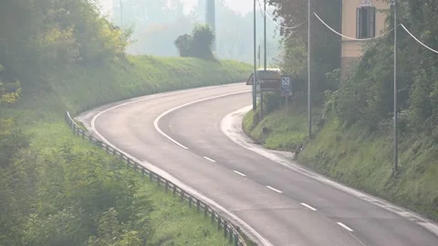 Sped up elevated view of traffic on steep curved road in Kranj, Slovenia Stock Footage 147035247