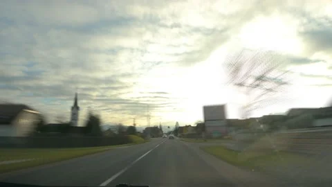 Sped up hyper lapse dashcam POV driving on countryside road in Slovenia Stock Footage 147398519
