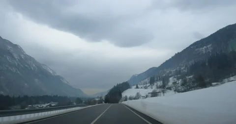Sped up hyper lapse dashcam POV point of view driving on road in Slovenia Stock Footage 147684271