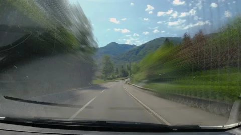 Sped up hyper lapse view of driving on countryside road in Slovenia Stock Footage 159278756