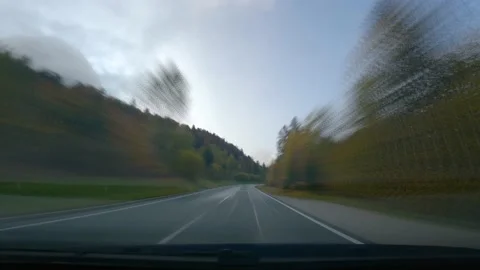 Sped up POV point of view dashcam driving on countryside road in Slovenia Stock Footage 142696691