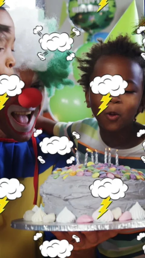 Speech bubble and thunder icons against kids blowing candles in a birthday party Stock Footage 343498575
