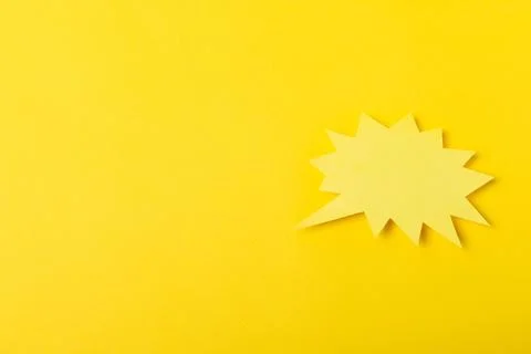 Speech bubble on a bright colored background. Stock Photos