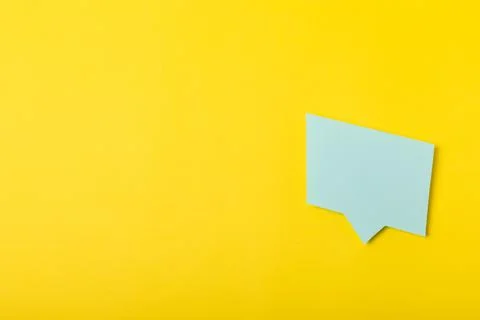 Speech bubble on a bright colored background. Stock Photos