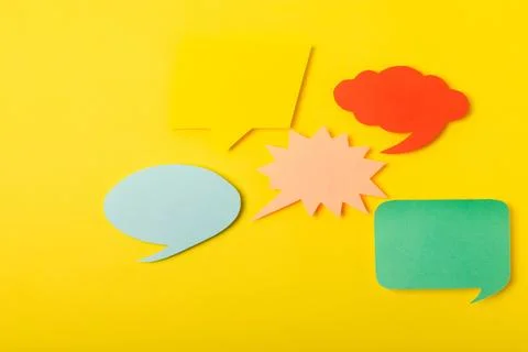 Speech bubble on a bright colored background. 스톡 사진