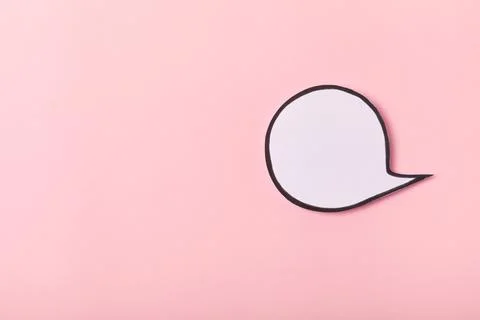 Speech bubble on a bright colored background. Stock Photos