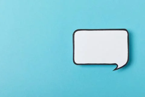 Speech bubble on a bright colored background. Stock Photos