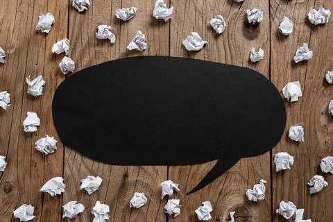 Speech Bubble On Floor With Important Information Written In With Paper Wraps Stock Photos