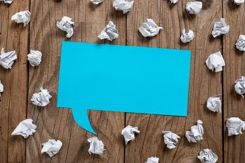 Speech Bubble On Floor With Important Information Written In With Paper Wraps Stock Photos