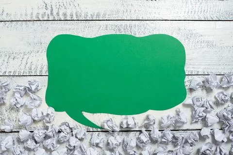 Speech Bubble On Floor With Important Information Written In With Paper Wraps Stock Photos