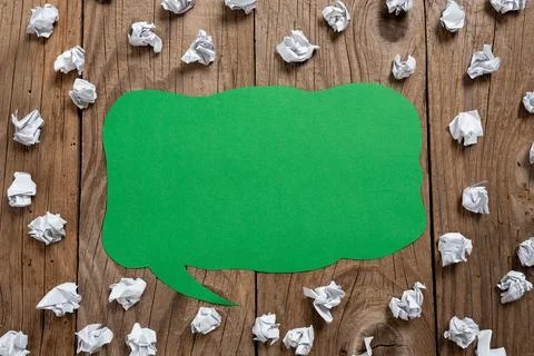 Speech Bubble On Floor With Important Information Written In With Paper Wraps Stock Photos
