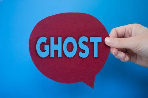 Speech bubble in front of colored background with Ghost text. 写真素材