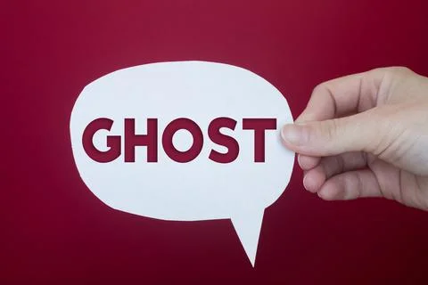 Speech bubble in front of colored background with Ghost text. Stock Photos