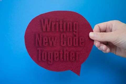 Speech bubble in front of colored background with Writing New Code Together.. 스톡 사진