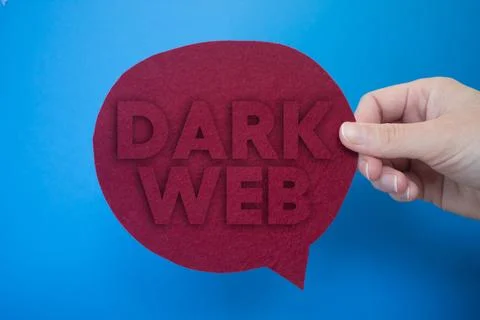 Speech bubble in front of colored background with Dark Web text. Stock Photos
