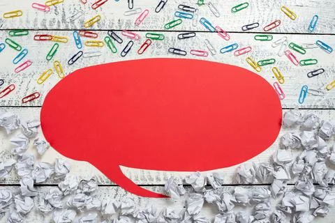 Speech Bubble With Important Ideas Divided On Half With Paper Wraps Underneath Stock Photos