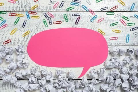 Speech Bubble With Important Ideas Divided On Half With Paper Wraps Underneath Stock Photos