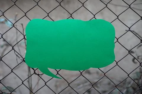 Speech Bubble With Important Informations Placed In Front Of Net. Dialogue Stock Photos