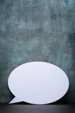Speech Bubble lightbox on table. Plastic light box in form of chat message ic Foto stock