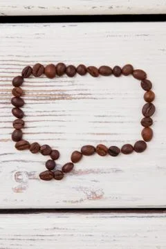 Speech bubble made from coffee beans. Stock Photos