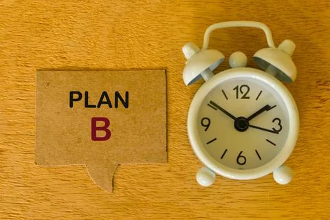 Speech bubble note written with PLAN B with clock. Business and education con Stock Photos