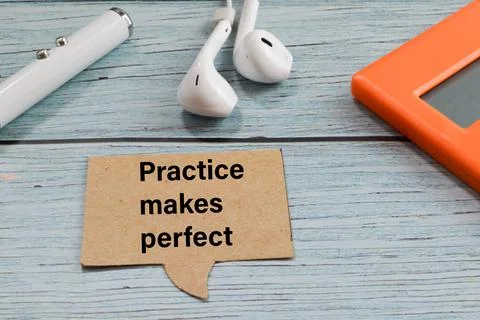 Speech bubble note written with PRACTICE MAKES PERFECT Stock Photos