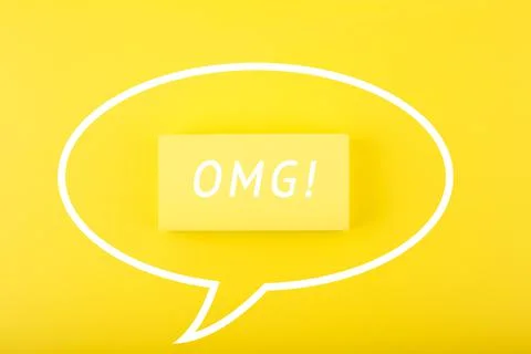Speech bubble OMG on bright yellow background Stock Photos