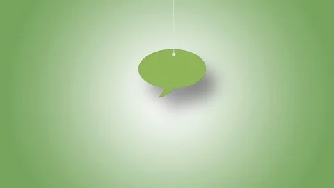 Speech Bubble in Yellow Hanged with String On Green Background in 4K Resolution Stock Footage 125931181