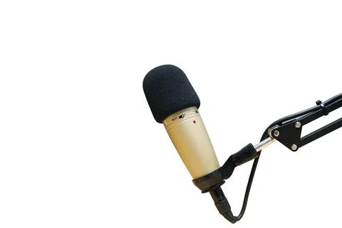 Speech microphone presents content on white background. In the recording room Stock Photos