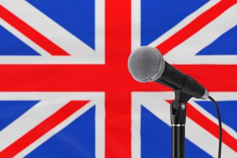 Speech Microphone Stand Against of Blurred Great Britain Flag. 3d Rendering Illustrazione stock