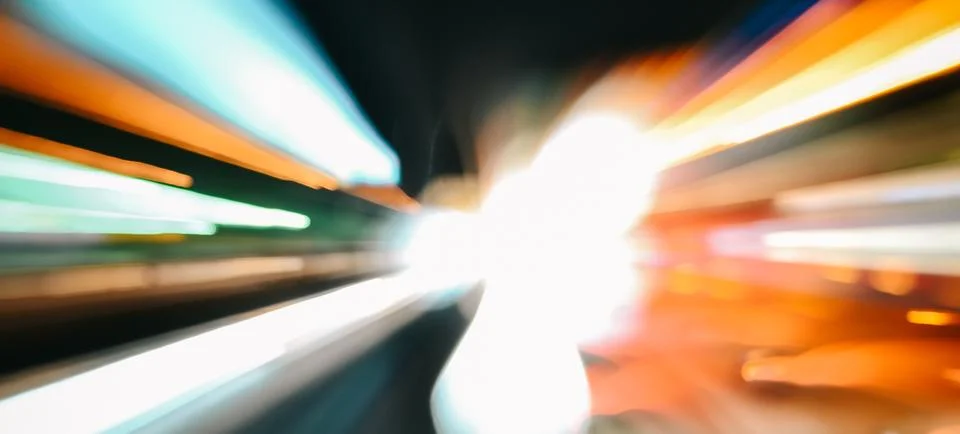 Speed accelerating blurred motion abstract multicolored background Stock Photos