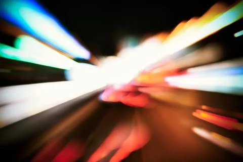 Speed accelerating blurred motion abstract multicolored background Stock Photos