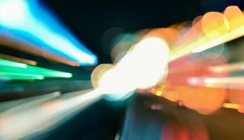 Speed accelerating blurred motion abstract multicolored background Stock Photos