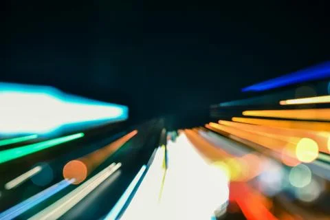 Speed accelerating blurred motion abstract multicolored background Stock Photos