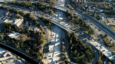 Speed Up Aerial View of Los Angeles Freeway / Highway / Suburbs Stock Footage