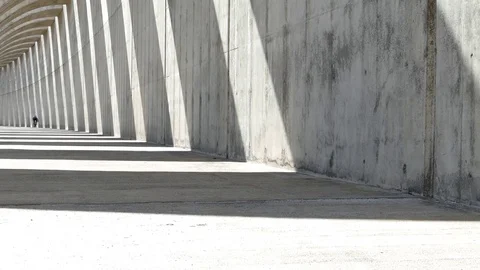 Speed up biking concrete arches Stock Footage 69903202