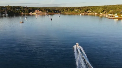 Speed Boat Approaching Camera Through Nova Scotia Coastal Cove Stock Footage 342862648