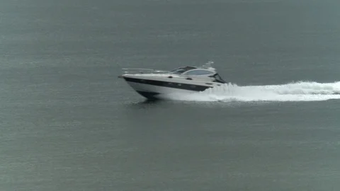 Speed Boat passes by Stock Footage 87064118