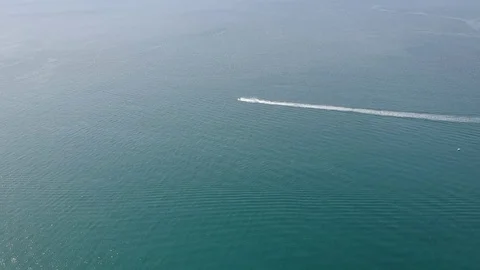 Speed boat scooter float fast speed wave sea Stock Footage 111072478