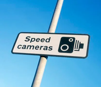 SPEED CAMERA WARNING SIGN Stock Photos
