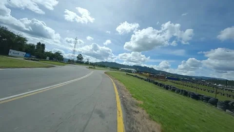 Speed on the car and motorcycle track dron fpv Video stock 237561908