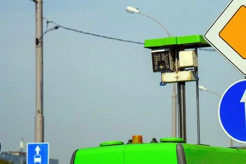 Speed control camera emerges from a specialized vehicle, integrated into an u Stock Photos