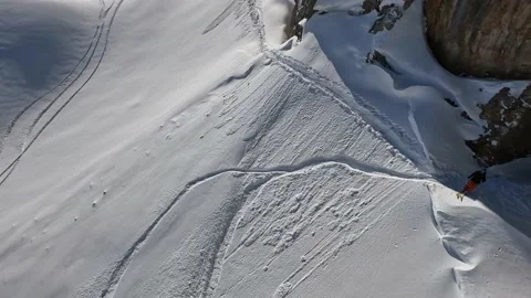 Speed dive trick mountain stone arch natural winter valley sunny landscape cliff Stock Footage 231088759