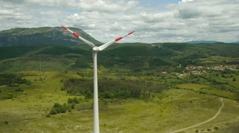 Speed up Flight around Windmill power line Stock-Footage 44972362