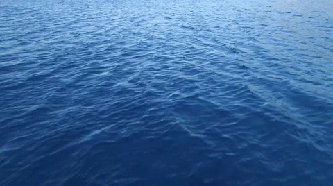 Speed flight over ocean, after tilt up camera. Stock Footage 58105617