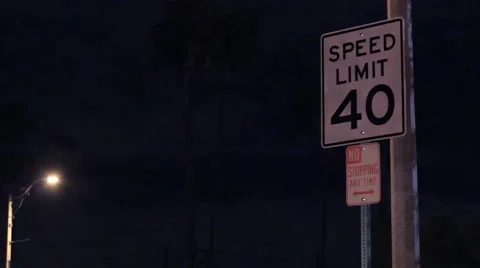 Speed limit 40 with no parking sign at night Stock Footage 47466153